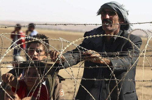 Xót xa hàng nghìn trẻ em Syria lếch thếch 'chạy loạn' phiến quân IS 10