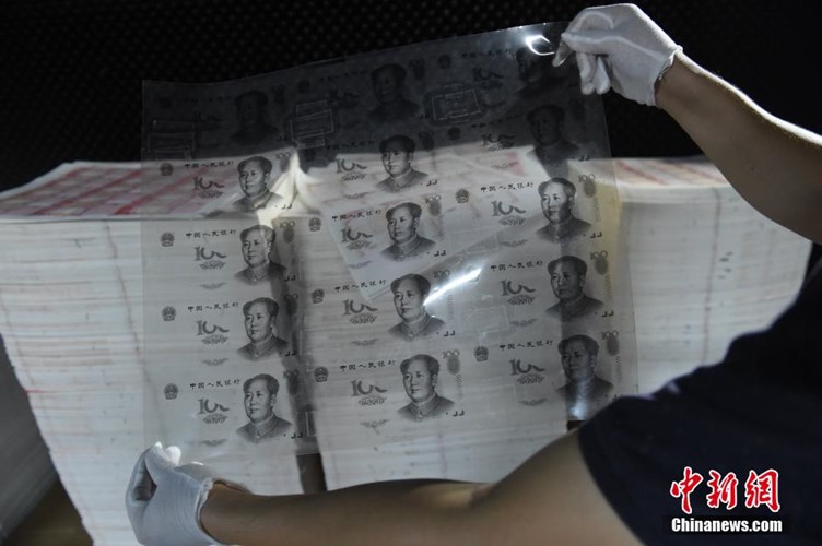 Trăm cảnh sát phá đường dây làm tiền giả chấn động Trung Quốc 7