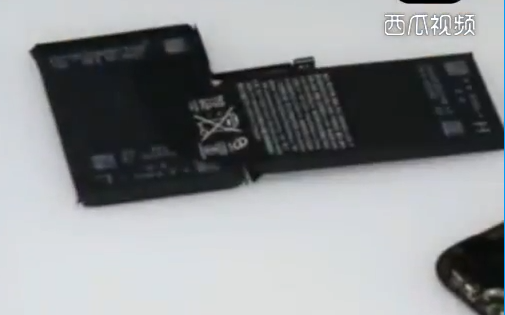 Đã có video mổ bụng iPhone X đầu tiên trên thế giới - Xuất hiện tới 2 viên Pin trong máy - Ảnh 1.