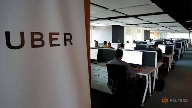 Grab sẽ tiếp nhận toàn bộ hơn 500 nhân viên của Uber tại khu vực Đông Nam Á - Ảnh 1.