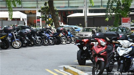 Singapore mạnh tay chi hơn 2.600 USD cho mỗi người dân nếu chịu bỏ xe máy cũ - Ảnh 1.
