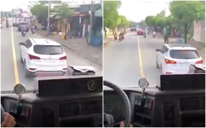Tài xế ô tô giả điếc cản đường xe cứu hoả đi làm nhiệm vụ suốt 4km ở Sài Gòn bị tước bằng lái xe - Ảnh 1.