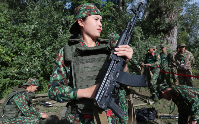 24h qua ảnh: Nữ quân nhân Việt Nam tham dự cuộc thi quân sự quốc tế - Ảnh 3.