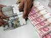 Ngân hàng Trung Quốc khử trùng tiền mặt ngăn virut corona lây lan
