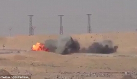 Video: Trúng tên lửa và phát nổ, xe bom IS vẫn phóng bạt mạng