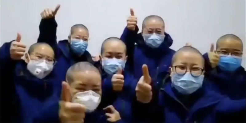 Một loạt y tá Trung Quốc cạo trọc đầu để tránh lây nhiễm virus corona 1