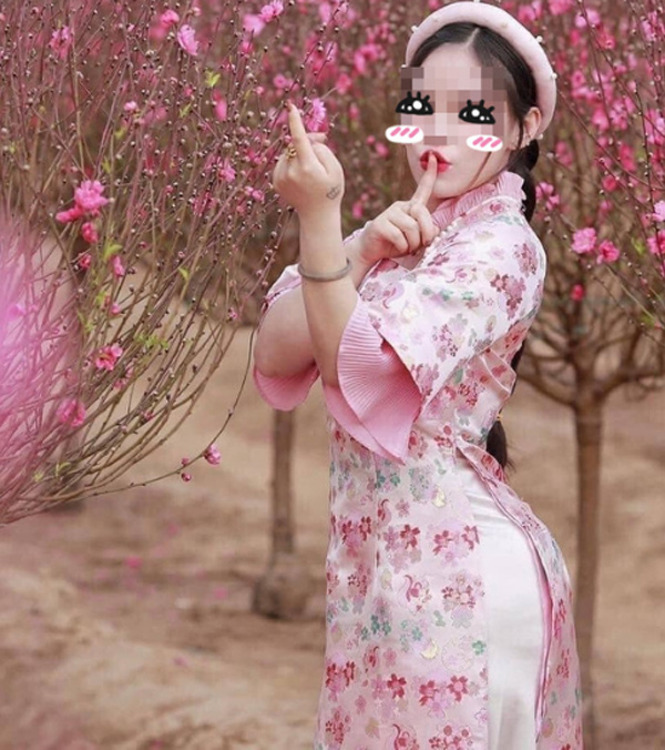 Thiếu nữ tạo dáng bên vườn đào Hà Nội khiến dân tình phải nhắc nhở 'cẩn thận gãy lưng' 3